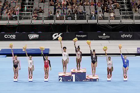 Gold medalist Simone Biles with others